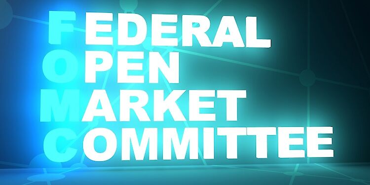 Federal Open Market Committee op een digitaal scherm met 'FOMC' in het blauw